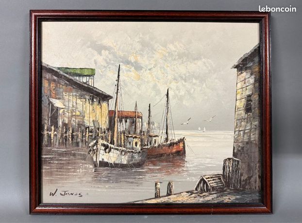 W JONES (XXe). Bateaux au port Huile sur toile signée en bas à gauche. 50 x 60 cm