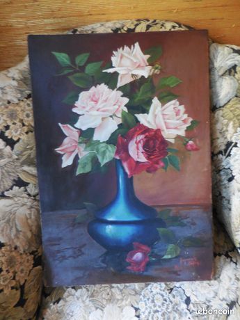 Tableau ancien ..Huile sur toile signé ..Roses dans un vase..54x38cm